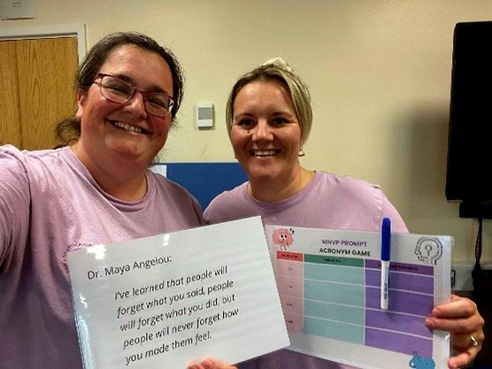 MNVP team members smiling with the MNVP acronym prompt game and a Maya Angelou quote