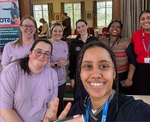 MNVP team members smiling together at a community engagement event